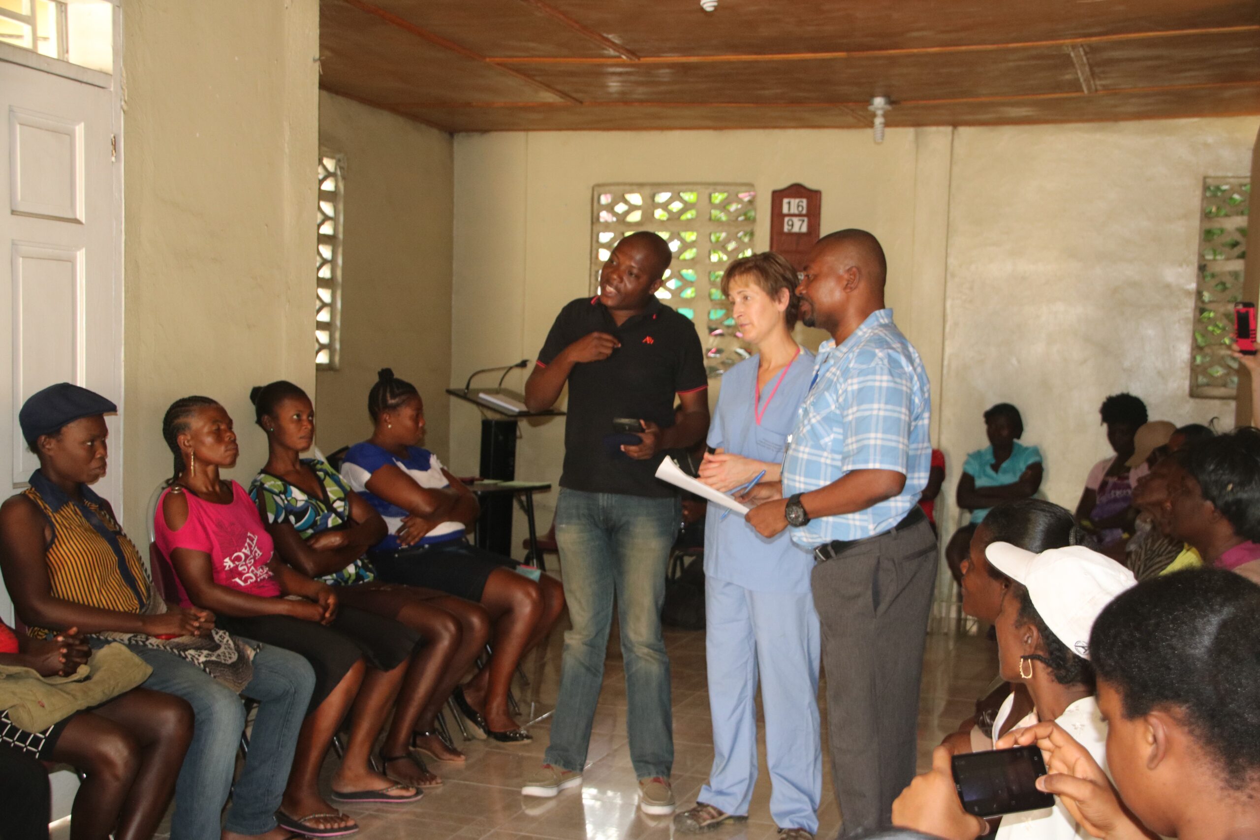 OB/GYNs educating on pre-eclampsia in Haiti and maternal health.