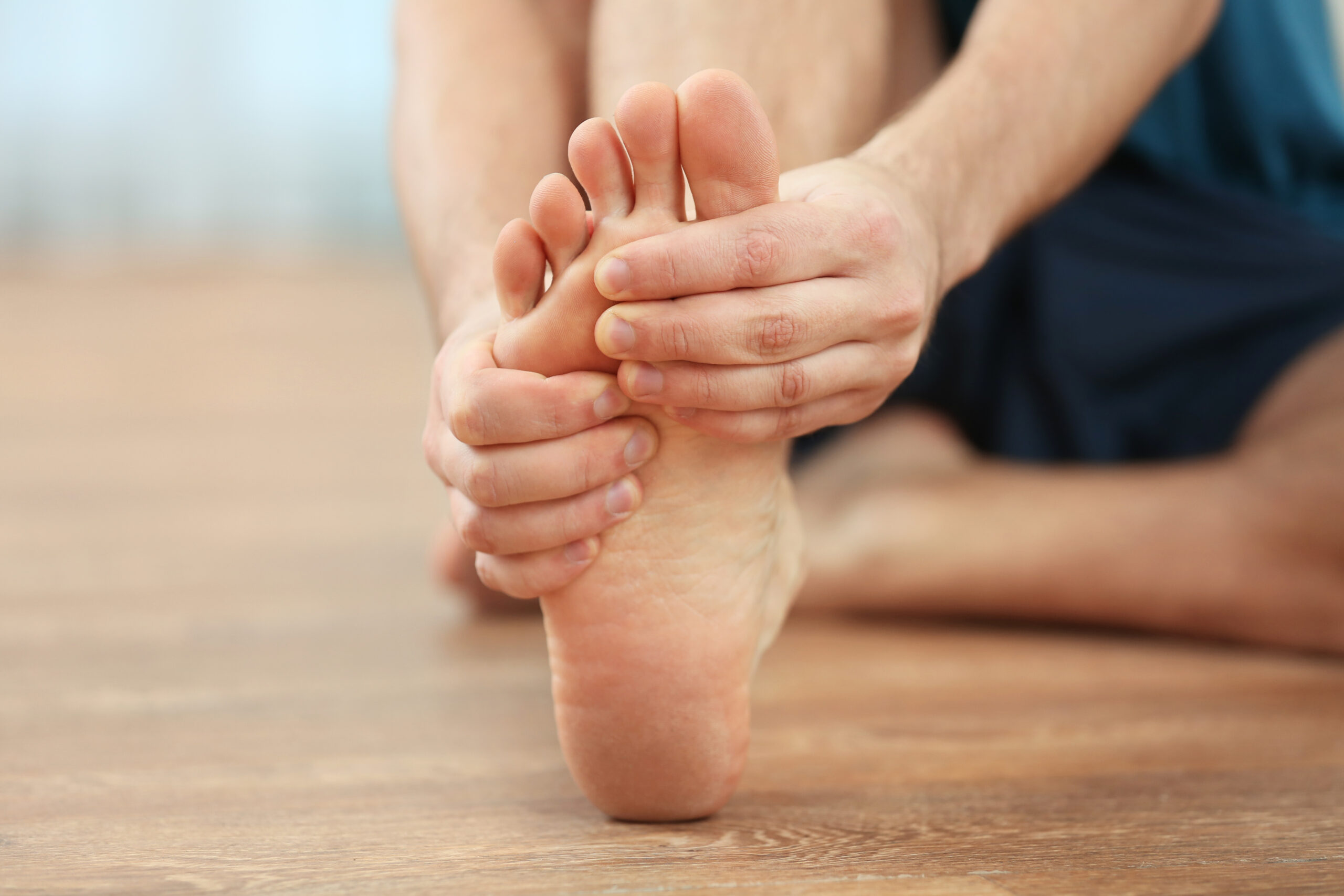 Man stretching his foot