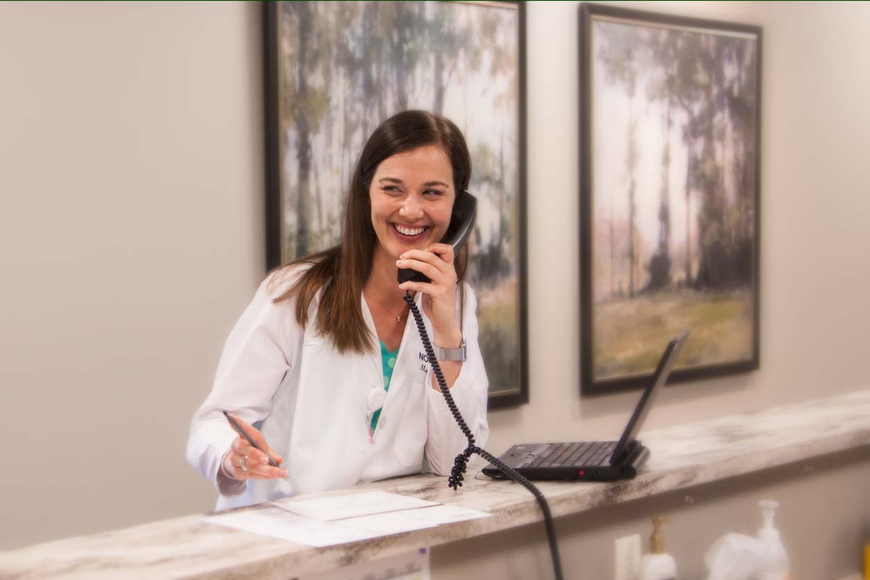 Plymouth Women's Healthcare doctor on the phone