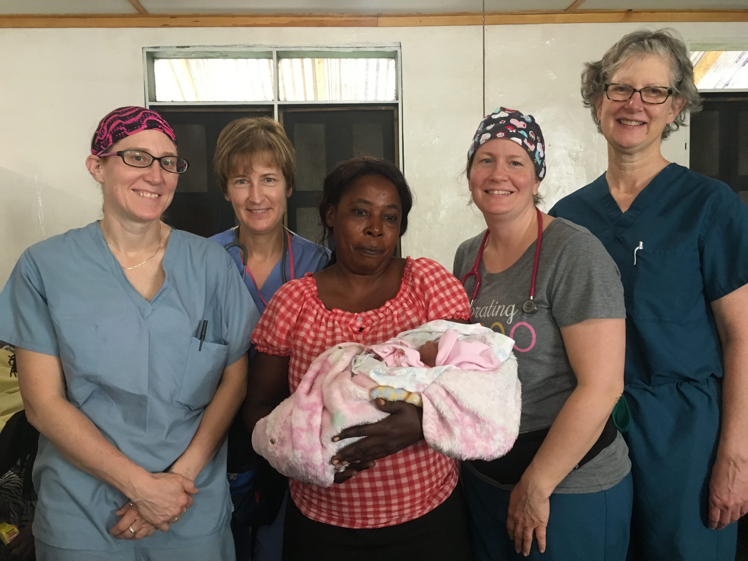 OB/GYN team educating on pre-eclampsia in Haiti.